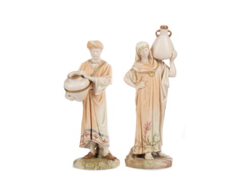 PAIR OF ROYAL WORCESTER ‘CAIRO WATER CARRIER’ FIGURES, the male and female figures in floral bordered robes, transfer marks i