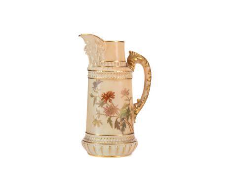 ROYAL WORCESTER BLUSH IVORY JUG, decorated with a floral spray and moulded mask spout, within gilt beaded borders, and scroll