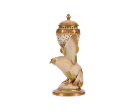 ROYAL WORCESTER BLUSH IVORY POT POURRI, the pierced bowl and cover supported by a bird with outstretched wings, on a circular