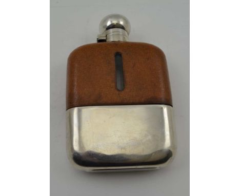 JAMES DIXON & SONS A SILVER MOUNTED SPIRIT FLASK, with leather cover, having bayonet twist cap and removable cup base, Sheffi