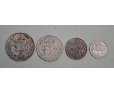 A SET OF FOUR SILVER MAUNDY COINS, 1895 