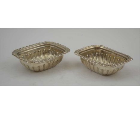 WILLIAM AITKEN A PAIR OF VICTORIAN SILVER SALTS, egg &amp; dart pressed rims, fluted bodies, Chester 1898, 6.5cm x 5cm, combi