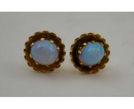 A PAIR OF 9CT GOLD OPAL SET EARRINGS, pierced fittings, gross weight; 2.6g 