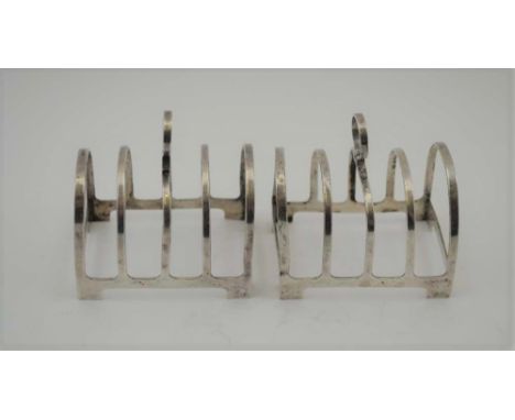 HAMILTON &amp; INCHES A PAIR OF ART DECO SILVER TOAST RACKS, Birmingham 1936, combined weight; 82g 