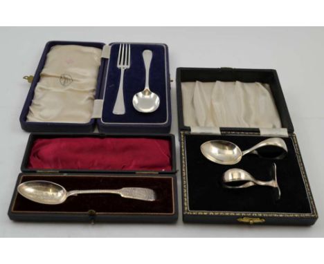 CHARLES WILLIAM FLETCHER A CASED CHILD'S SPOON AND FORK, Sheffield 1944, a baby spoon and pusher, Birmingham 1955, and a chil