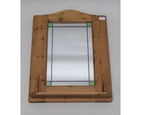 A PINE FRAMED WALL MIRROR, leaded mirror plate, with shelf to the base, overall size; 64cm x 49cm 