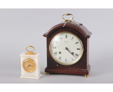 A Comitti of London mahogany cased mantel clock with white enamel dial and Roman numerals, 9 1/2" high, and an Imhof white st