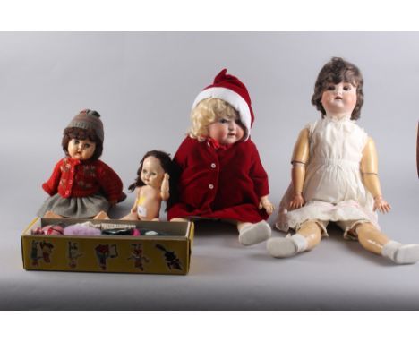 A Pelham Standard Puppet, "SM Old Lady", in box, and four dolls 