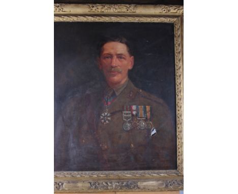 An oil on canvas portrait of Col. Henry Manwaring Parker, in uniform with medals, 29" x 24 1/2", in gilt frame (holed)
