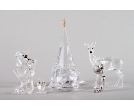 A Swarovski model of a swan, 2" high, a similar model of a koala and joey, 3" high, a Christmas tree and four other glass mod