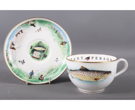 A Poole pottery hors d'oeuvres dish, 13" wide, a Poole model of an otter with a fish, 4 1/2" high, a Royal Worcester breakfas