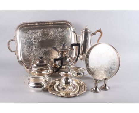 A silver plated coffee pot, a matching teapot, a two-handled plated tray, 22" wide, a gravy boat and other silver plate 