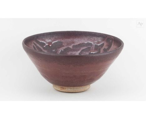 † WILLIAM STAITE MURRAY (1881-1962); a stoneware bowl covered in kaki glaze with wax resist decoration, impressed M mark, dia