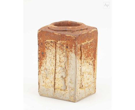 † IAN AULD (1926-2000); a square stoneware pot with raised rectangular panels to each face and incised marks, impressed IA ma