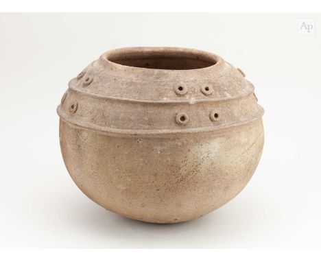 † MAGDALENE ODUNDO (born 1950); an early globular stoneware vessel partially covered in green ash glaze with applied decorati