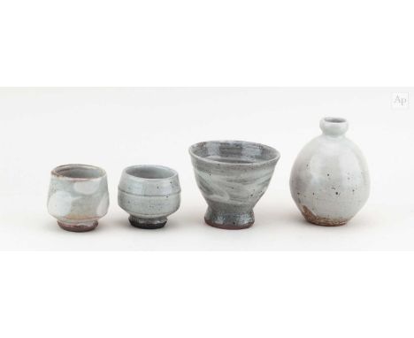 † PHIL ROGERS (1951-2020); a stoneware sake bottle covered in speckled grey glaze, impressed PR mark, height 12cm, and a foot