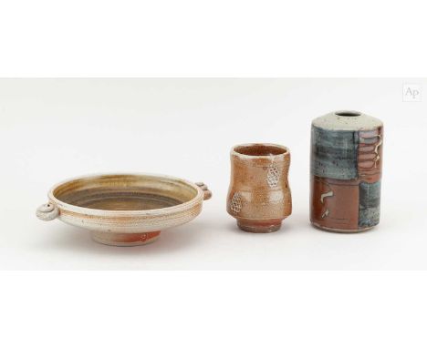 † SHEILA CASSON (1930-2022); a salt glazed twin handled dish, impressed SC mark, diameter 22.5cm, a cylindrical pot by David 