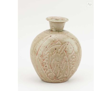 † PHIL ROGERS (1951-2020); a flattened stoneware bottle covered in green ash glaze with incised decoration, impressed PR mark