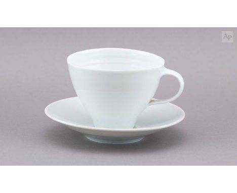 † JOANNA CONSTANTINIDIS (1927-2000); a porcelain cup and saucer covered in celadon glaze, impressed C marks, made circa 1994,