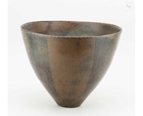 † JOHN WARD (1938-2023); a large deep stoneware bowl with light scalloping or pinching detail to the rim covered in bronze an