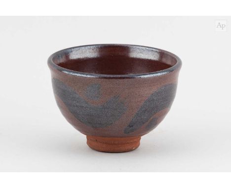 † WILLIAM STAITE MURRAY (1881-1962); a small stoneware bowl covered in kaki glaze with iron decoration, impressed M mark, dia