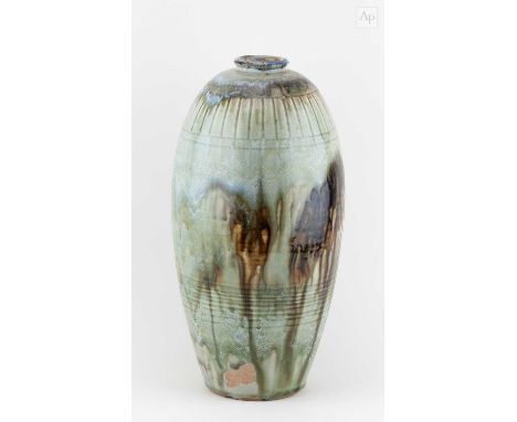 † REGINALD MARLOW; a tall stoneware bottle covered in green ash glaze with running iron decoration, painted RM mark, height 3