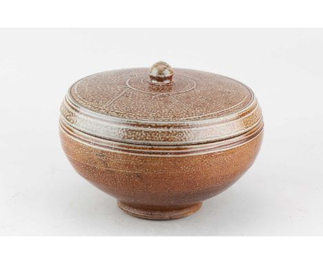 † PHIL ROGERS (1951-2020); a large salt glazed bowl and cover with incised decoration, impressed PR mark, diameter 23.5cm.Con