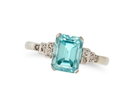 A BLUE ZICON AND DIAMOND DRESS RING in 18ct white gold and platinum, set with an octagonal step cut blue zircon, the stepped 