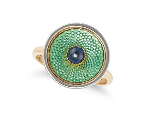 A SAPPHIRE AND ENAMEL RING in 18ct yellow gold, the circular face set with a round cabochon sapphire in a border of green gui