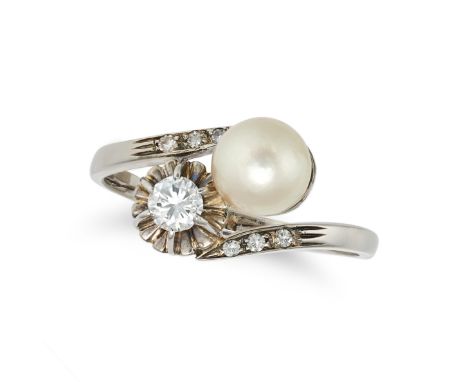 A PEARL AND DIAMOND TOI ET MOI RING in white gold, set with a pearl of 7.4mm and a round brilliant cut diamond of approximate