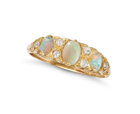 AN OPAL AND DIAMOND RING in 18ct yellow gold,&nbsp;set with three oval cabochon opals, accented by old cut diamonds, partial 