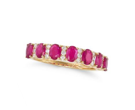 A RUBY AND DIAMOND HALF ETERNITY RING in 18ct yellow gold, set with seven oval cut rubies accented by trios of round brillian