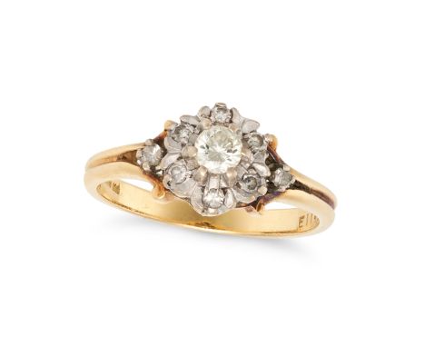 NO RESERVE - A VINTAGE DIAMOND CLUSTER RING in 18ct yellow gold, set with a round brilliant cut diamond in a cluster of singl