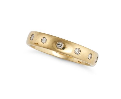 A DIAMOND BAND RING in 18ct yellow gold,&nbsp; set with seven round brilliant cut diamonds,&nbsp;full British hallmarks, size