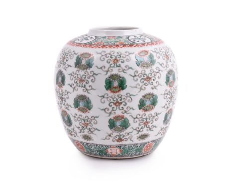 A Chinese Famille Verte jar, Qing dynasty, 19th century, painted with an alternating leaf and scroll design the base with six