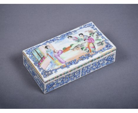 A Cantonese Famille Rose pen tray, circa 1860, painted with figures within blue key-fret borders, 17cm wide x 9cm deep x 4.5c