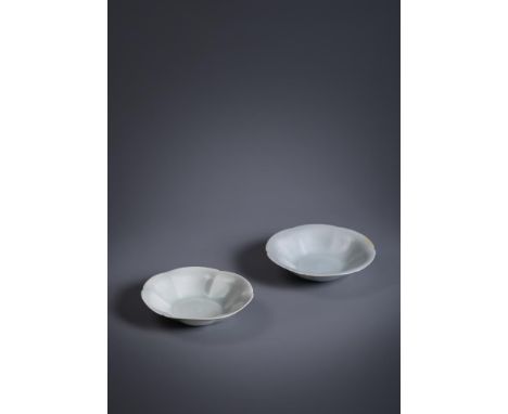 A pair of Chinese qingbai lobed bowls, Song Dynasty (960-1279), each finely potted body with six-lobed flaring sides rising f