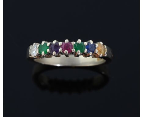 'Dearest' gem set ring. mounted in 18ct white gold,  set with a Diamond, Emerald, Amethyst, Ruby, Emerald, Sapphire and Topaz