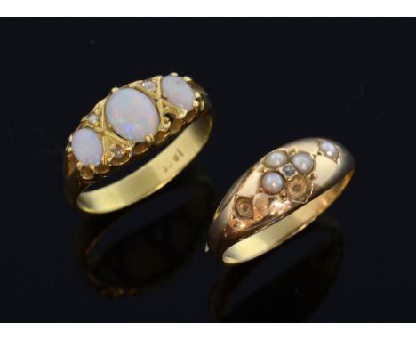 Two Victorian gem set rings. an opal and diamond set ring,  gold and a seed pearl set ring , both 18ct 