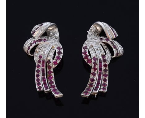 Art Deco, Diamond and ruby clips. pave set with diamonds, brilliant and baguette cut, and calibre and emerald  cut rubies in 