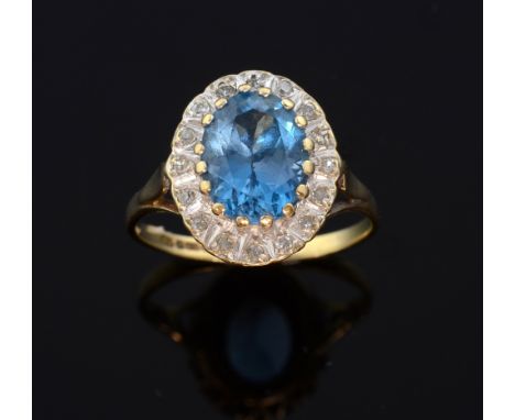 Blue topaz and diamond ring 
