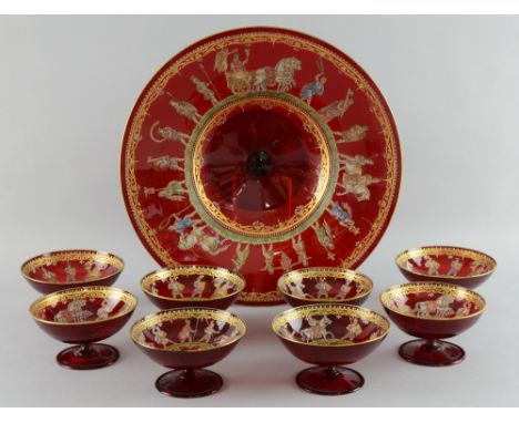19th century ruby glass over enamelled gilt and jewelled decorated suite of eight dishes and a comport, 31 cms and 10-11 cms