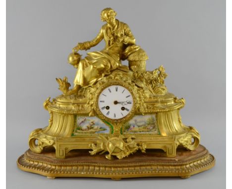 19th century French gilt metal mantel clock inset with porcelain panels by A Brocot  & Delettrez  Paris, the case surmounted 