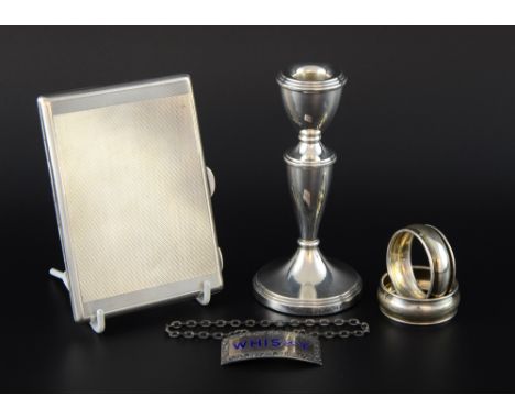 Silver cigarette case Whisky label, candlestick and two napkin rings,