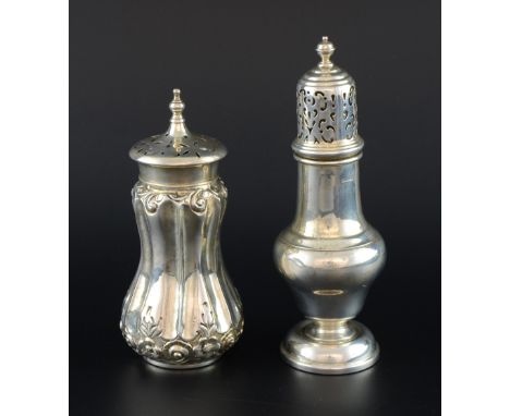 George V silver sugar caster of waisted fluted form by Arthur Harris, Birmingham, 1915, and another baluster form sugar caste