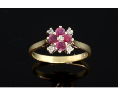 Ruby and diamond dress ring. in 9 ct yellow gold mount 