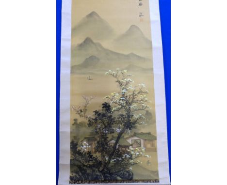 Chinese scroll depicting a landscape with a mountain,