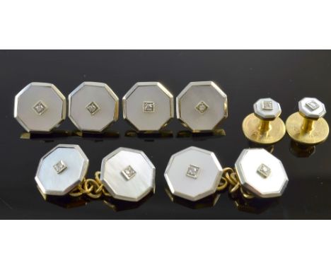  Mother of pearl and diamond set cufflinks. in platinum and 9ct gold, in Selfridges case 