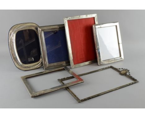 Three modern silver photograph frames and three others, (6),