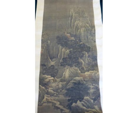 Chinese scroll depicting buildings and figures on a mountainside, 75cm x 34cm,